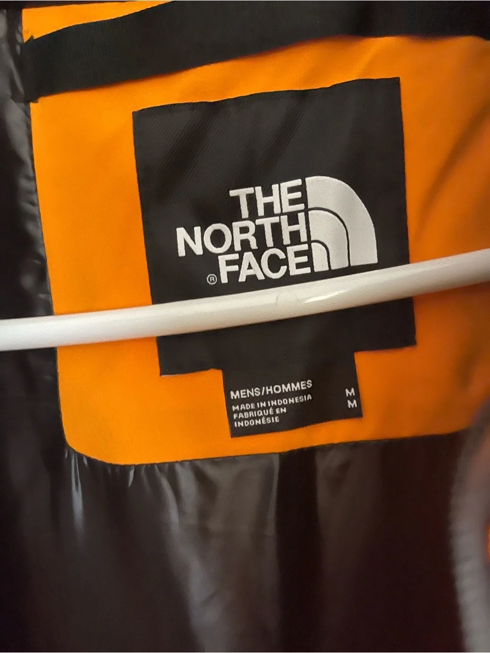 The North Face Men’s Orange and Black Hooded Puffer Jacket